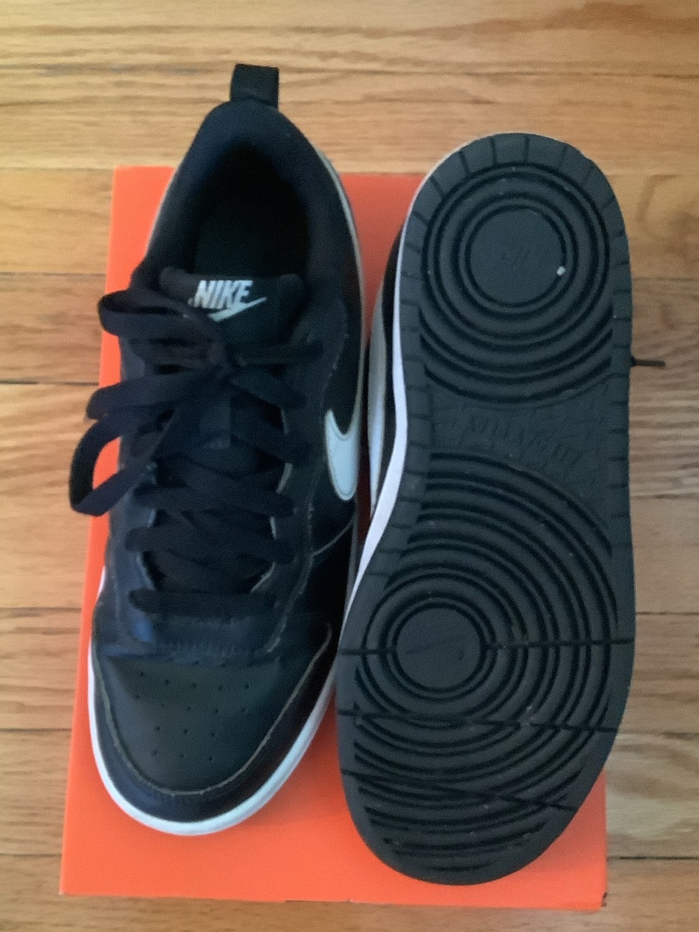 Nike Black Sneakers with White Swoosh